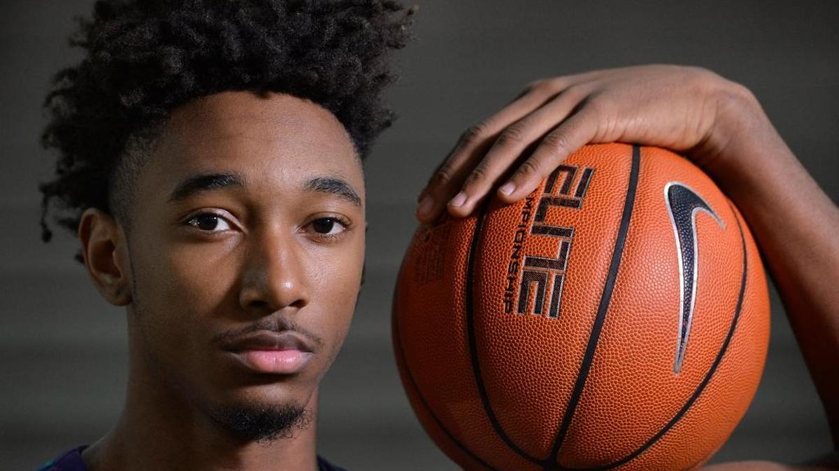 Cox Mill High basketball player Rechon Black signed with UNC on Wednesday.