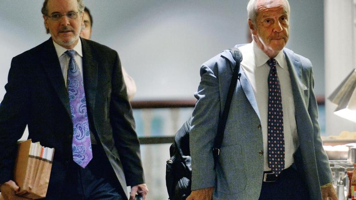 North Carolina basketball coach Roy Williams and his lawyer Jim Cooney, left, arrive at an NCAA hearing Wednesday, Aug. 16, 2017, in Nashville.