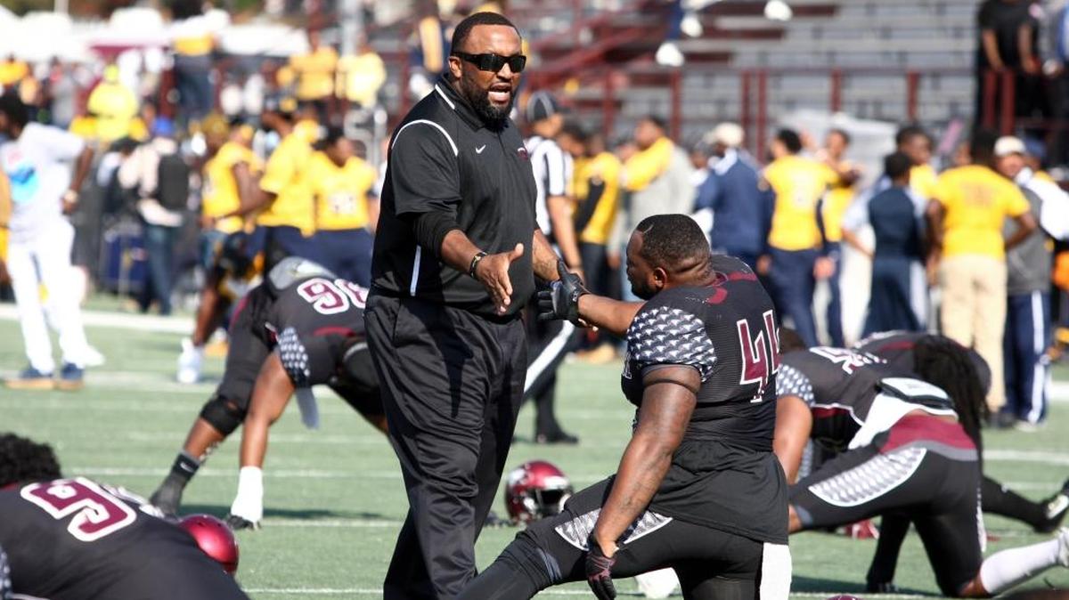 North Carolina Central defensive coach Jon Bradley talks to defensive tackle Cyrus Stanback before a game last season in Durham.