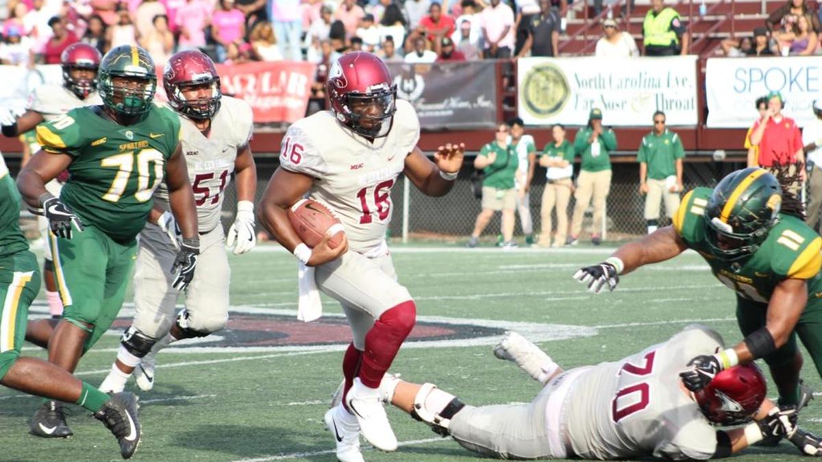 North Carolina Central quarterback Naiil Ramadan breaks for a big gain against Norfolk State Saturday at O’Kelly-Riddick Stadium.