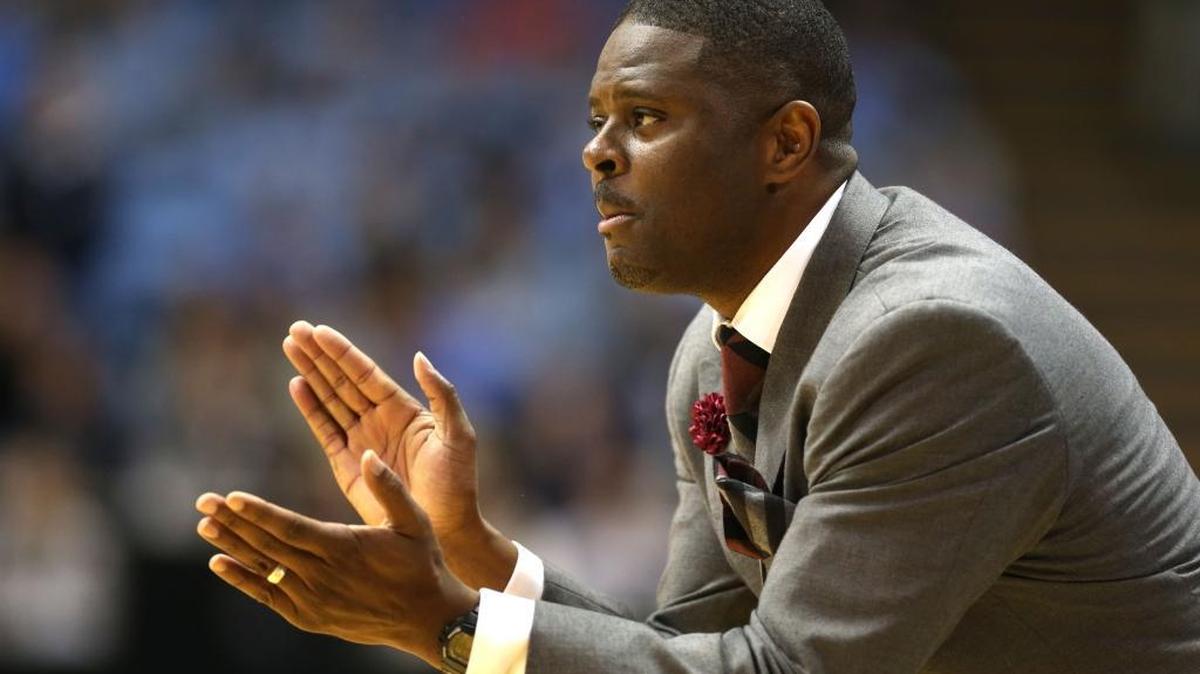NCCU head coach LeVelle Moton applauds his team's performance during the first half against North Carolina on Nov. 14, 2014 at the Smith Center in Chapel Hill.