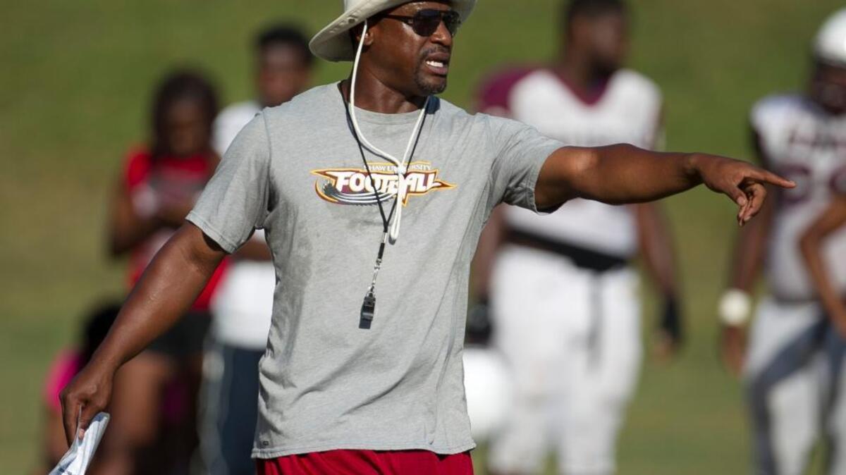 Shaw head football coach Adrian Jones directs his team during practice in 2016.