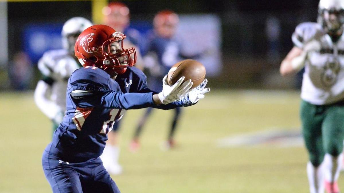 Dyson Freeman (11) of Jordan catches a 30-yard pass and runs for a touchdown against the pursuit of Max Mcintyre (8) of Green Hope. The Green Hope Falcons visited the Jordan Falcons in a high school football game on Oct. 27, 2017. Green Hope won 48-20.