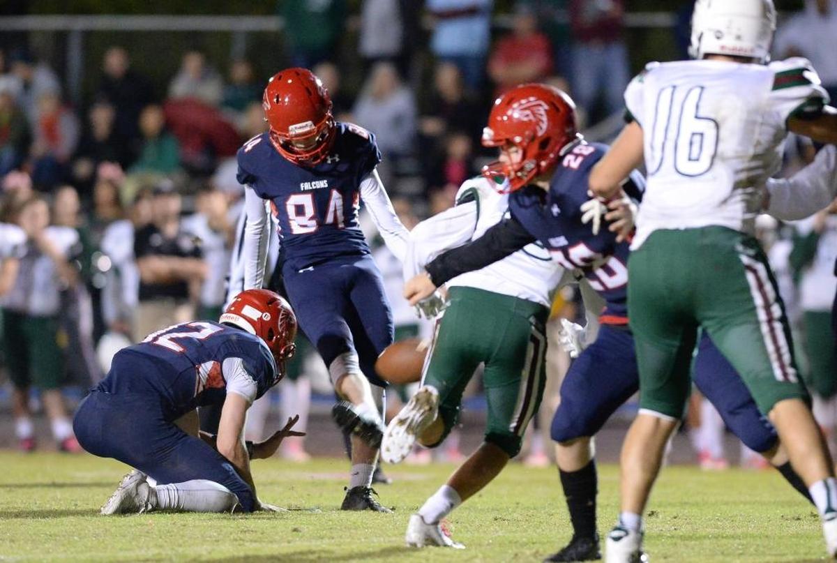 Jordan kicker Conor MacDougall makes the kick in an Oct. 27 high school football game against the Green Hope Falcons.