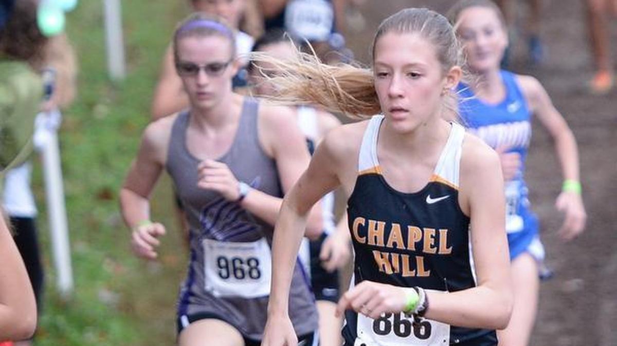 Katherine Dokholyan (866) of Chapel Hill runs during the 3A NCHSAA Cross Country Championships that took place at the Ivey M. Redmon Sports Complex in Kernersville, N.C. on Saturday, November 7, 2015.