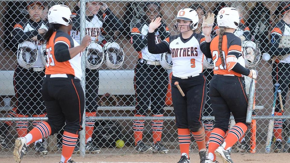 Olivia Ruff (9) of Orange congratulates her teammates Alisha Pettiford (35) and Jaden Hurdle (23) after they score for the Panthers. Orange opens play tonight against West Brunswick in the 3-A East Region championship.