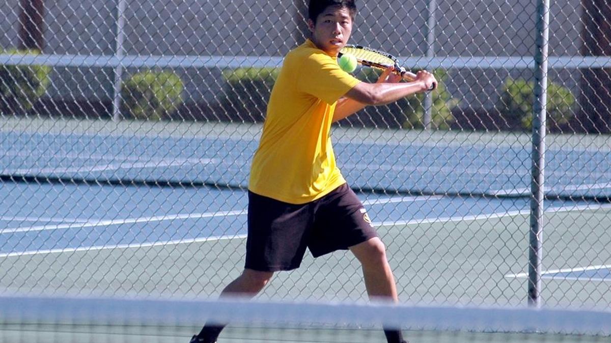 Chapel Hill's Paul Tsui prepares to return a shot on Wednesday, May 17, 2017 in the Tiger's 3-A East Region championship match at Fayetteville Terry Sanford. Chapel Hill lost 6-3.