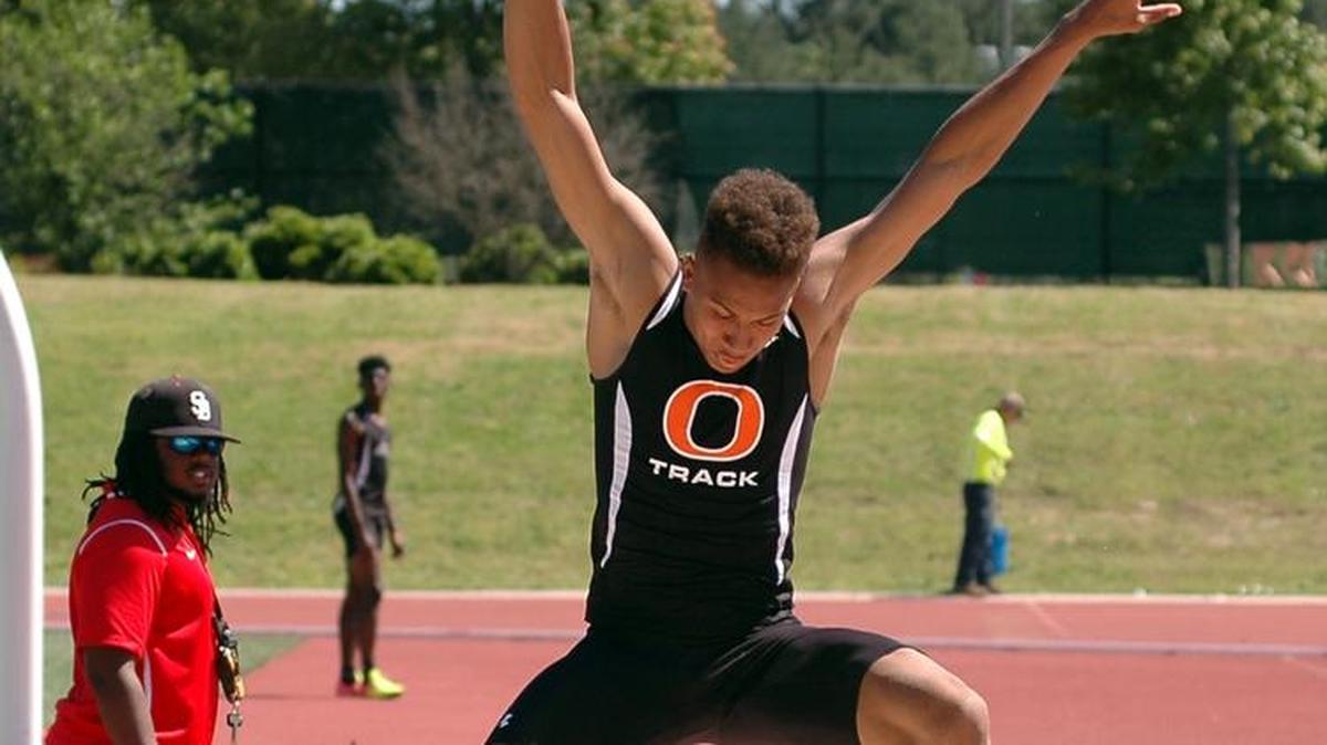 Long jump winner Jamar Davis of Orange competes during the Big Eight track championships on Wednesday, May 3, 2017 at Durham County Stadium.