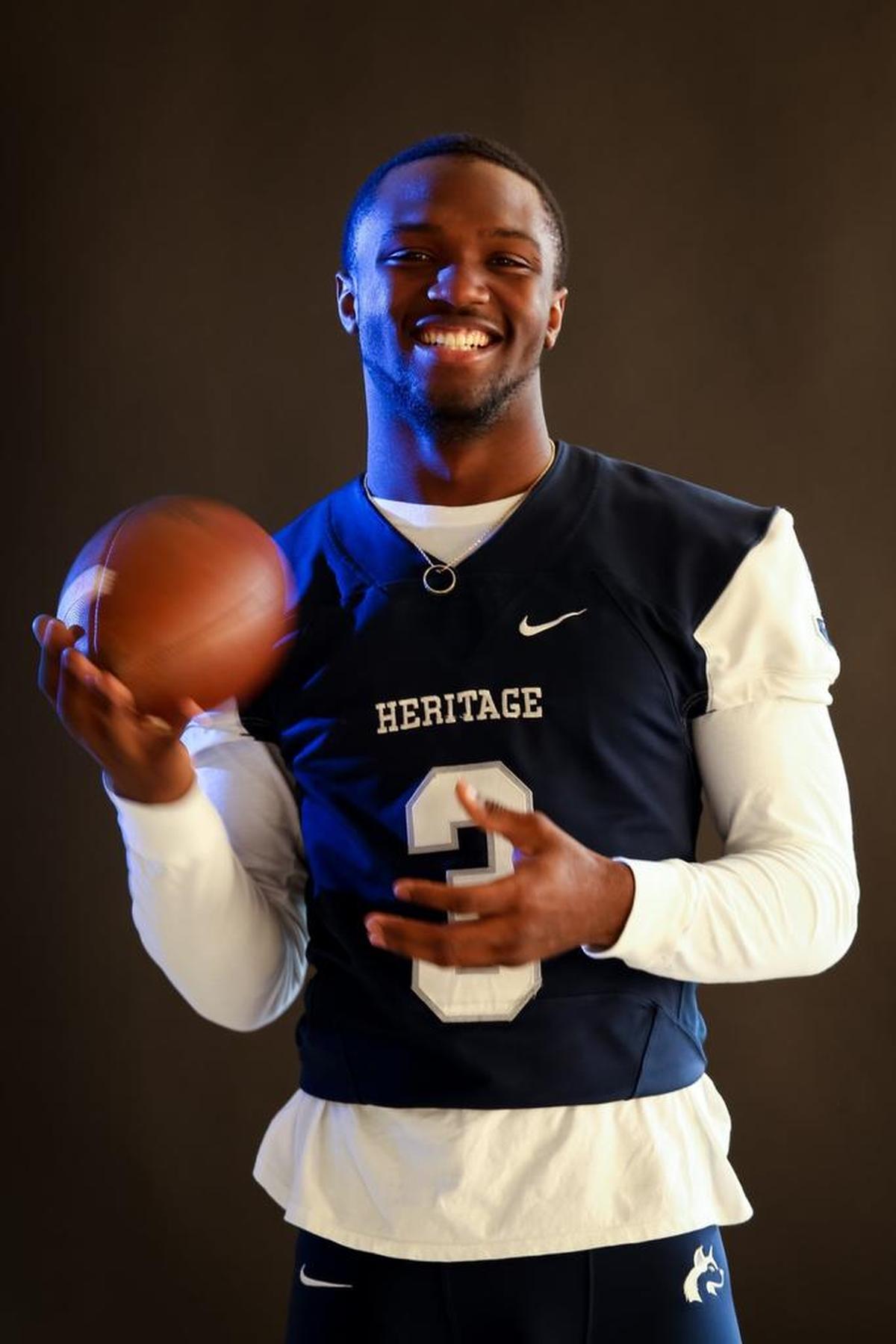 Heritage's Ricky Person, a member of the N&O All-Metro Football Team, poses for a portait on Thursday, December 21, 2017.