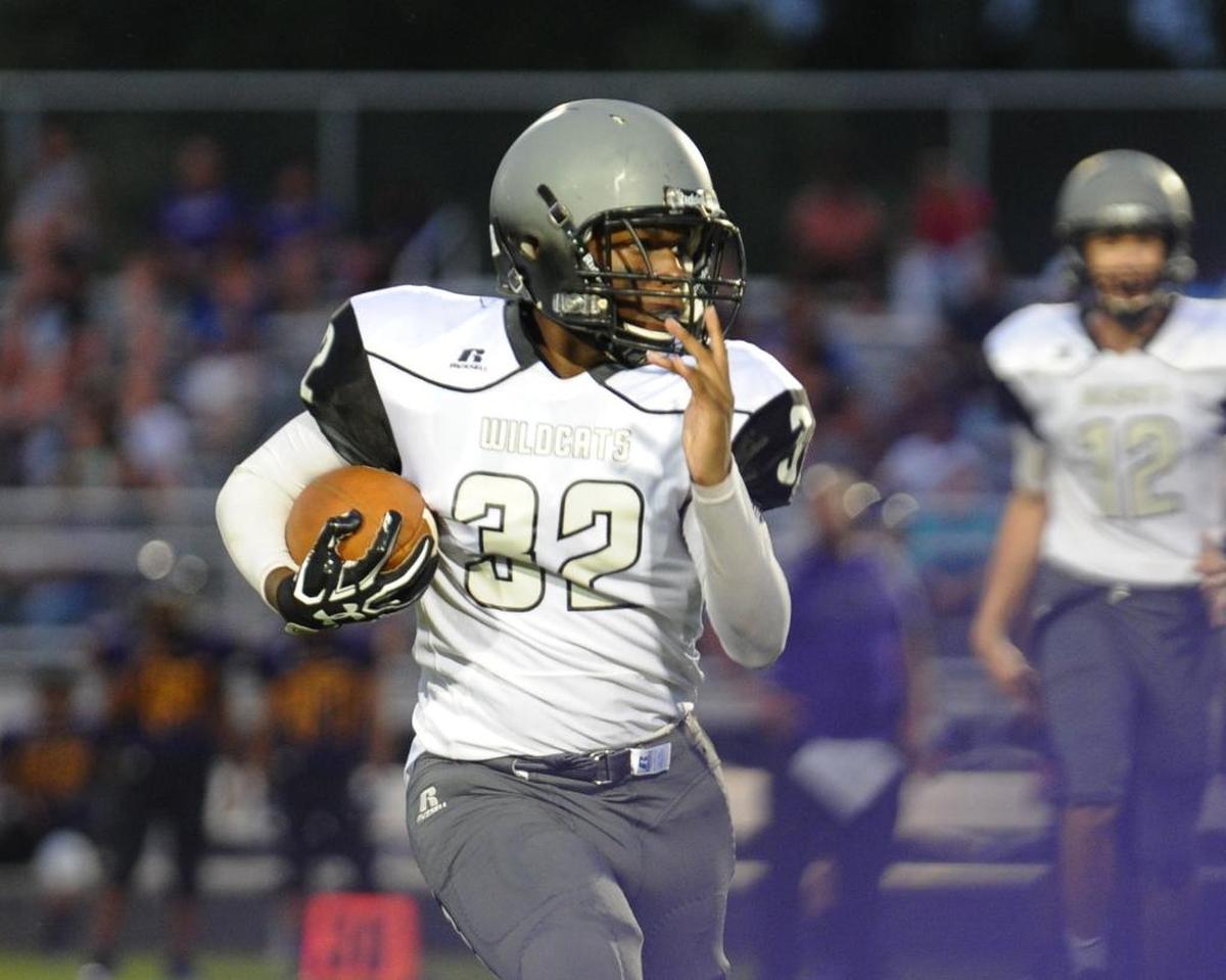 East Chapel Hill's Jalen Williams runs the ball during the JV football game between the East Chapel Hill Wildcats and the Carrboro Jaguars, which was played in Carrboro on Thursday, August 24, 2017.