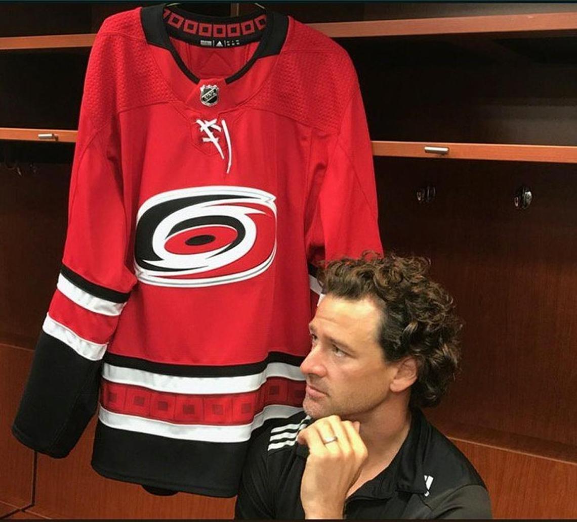 The Carolina Hurricanes' Justin Williams talks to the media at PNC Arena earlier this summer after he was signed as a free agent. Williams played on the Canes' 2006 Stanley Cup team and has played with a couple other teams in the years since. The Canes re-acquired him, hoping he brings an offensive spark to the team.