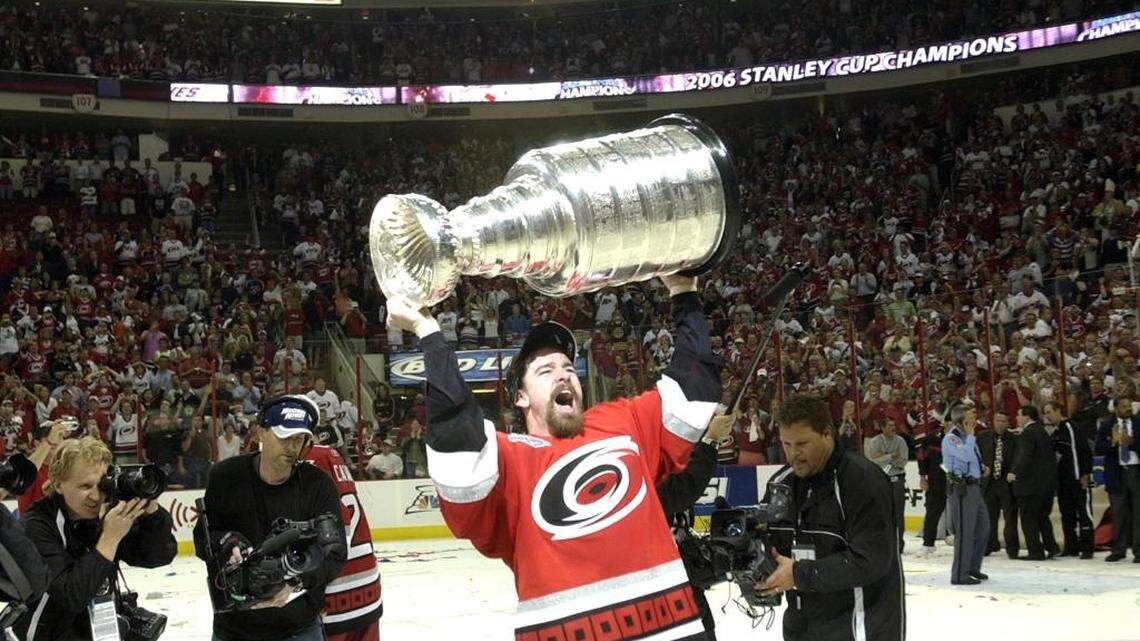 Justin Williams hoists the Stanley Cup at the RBC Center on June 19, 2006. staff/Ted Richardson.