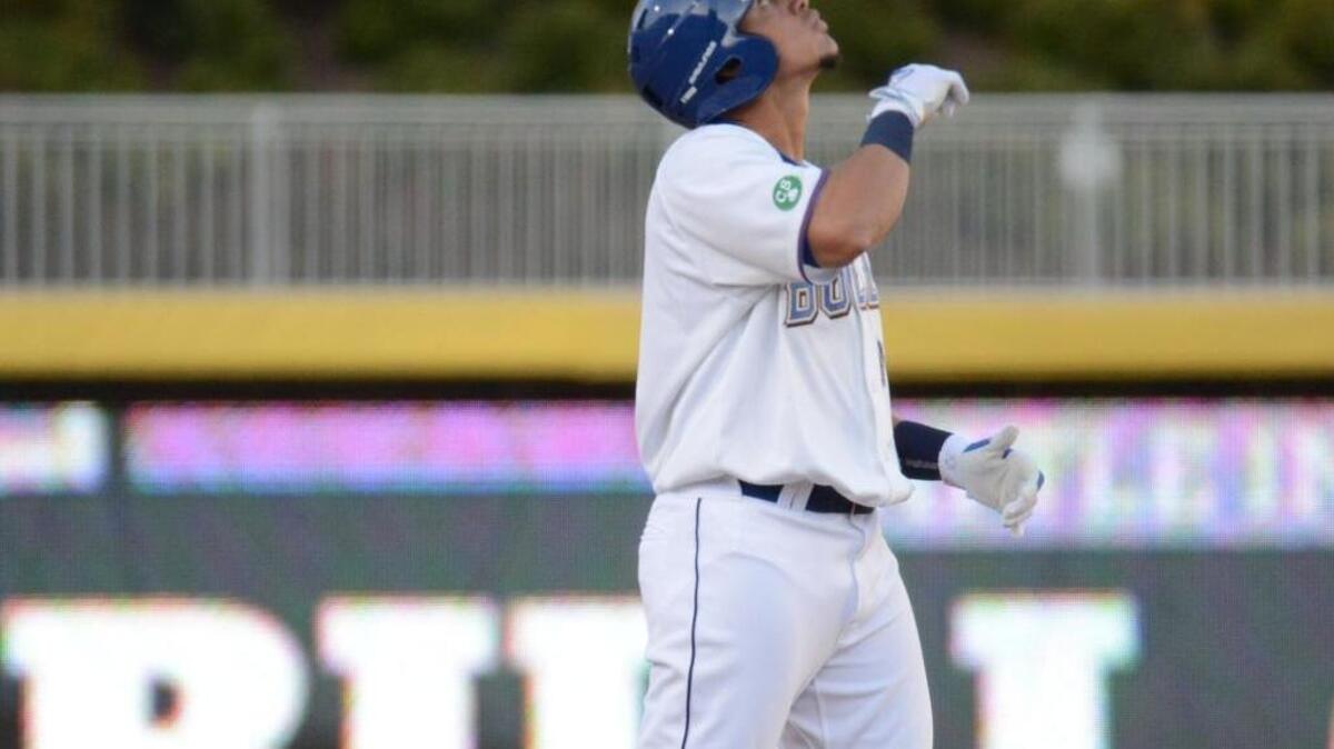 Durham Bulls' Willie Adames reacts after scoring against the Duke Blue Devils at the Durham Bulls Athletic Park during an exhibition game last week. Adames is the Tampa Bay Rays’ No. 1-rated prospect.