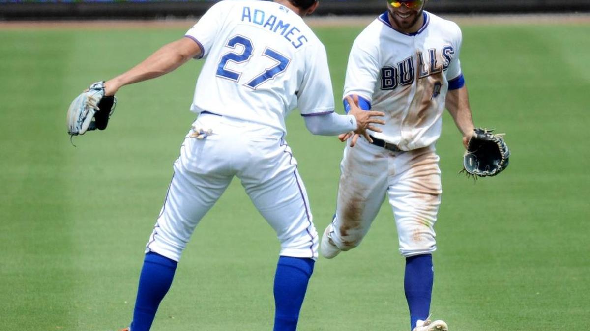 The Durham Bulls’ Willy Adames, left, and Johnny Field, right, face the RailRiders Tuesday in Game 1 of the Governor’s Cup.