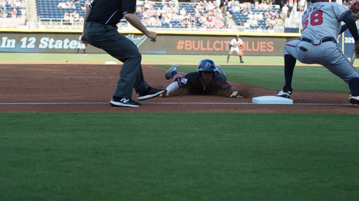 Durham’s Mallex Smith slides into third during a recent game at the DBAP. Smith leads the Bulls with 16 stolen bases.
