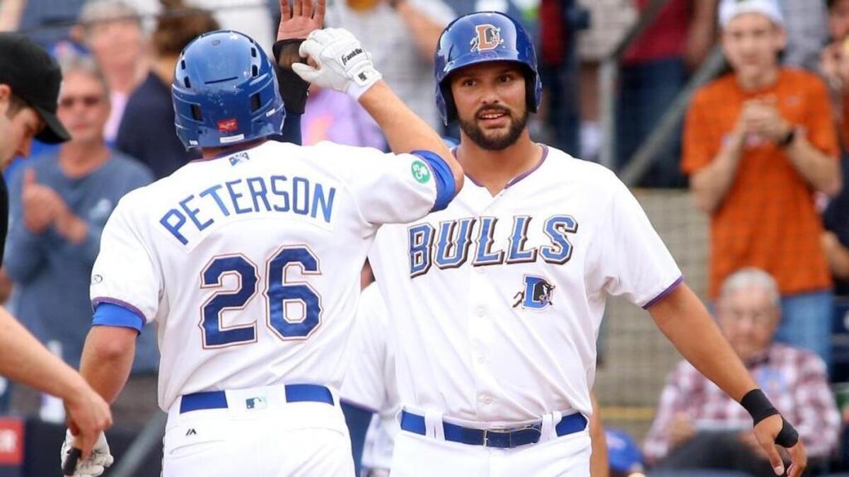 Durham Bulls' Patrick Leonard (right) was named the IL Player of the Month on Monday.