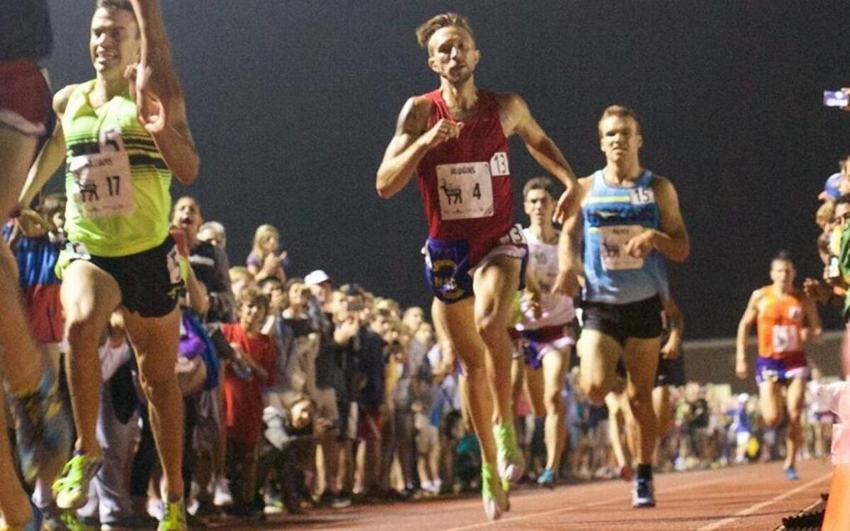 Barely touching the ground, Brandon Hudgins races toward the finish of the Sir Walter Miler in 2015