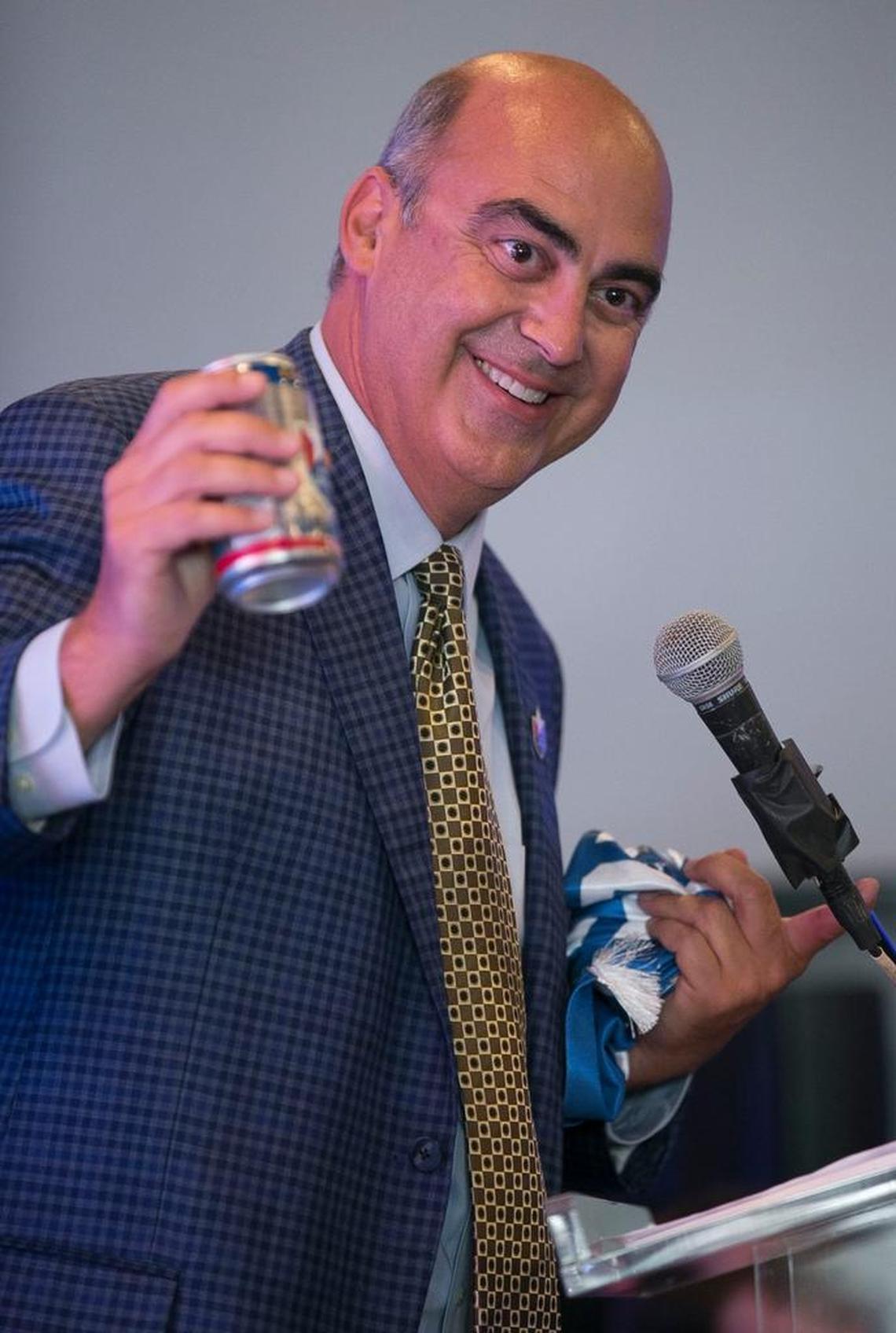 North Carolina FC president Steve Malik speaks to soccer fans during a rally at City Market to promote Raleigh as a MLS expansion city on Wednesday.