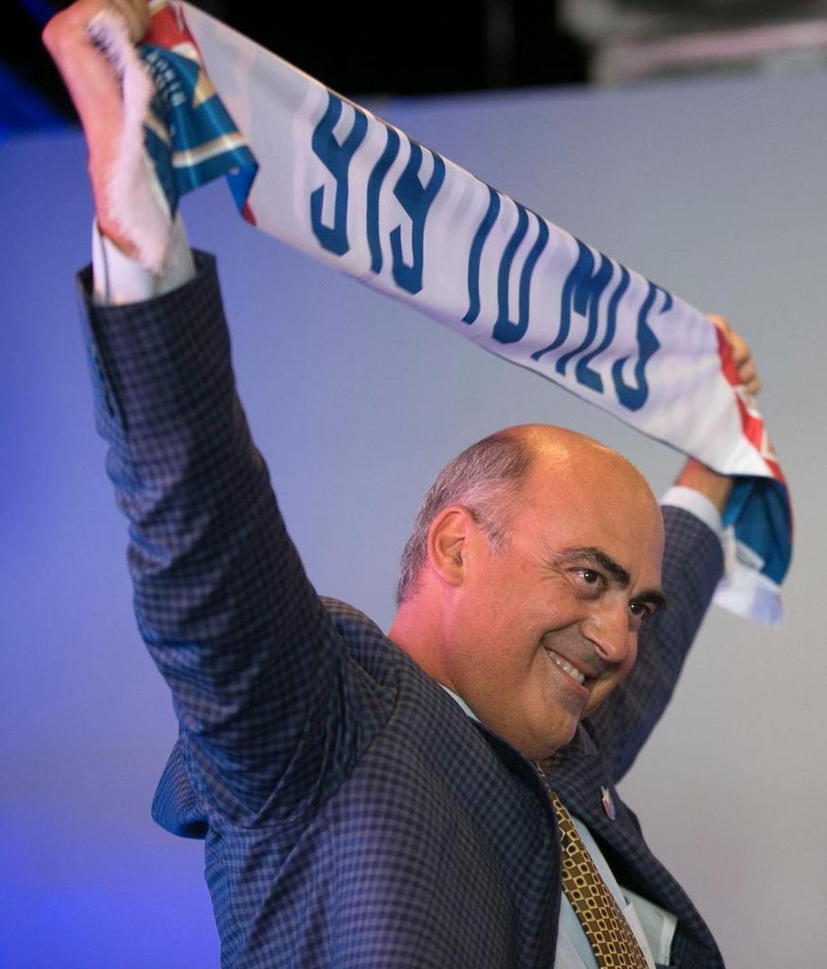 The North Carolina Football Club president Steve Malik addresses a rally of soccer fans at City Market to promote Raleigh as a MLS expansion city on July 19, 2017.