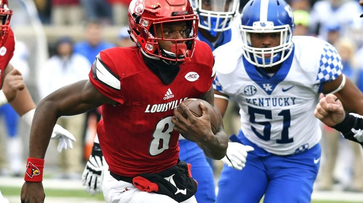 Louisville's Lamar Jackson (8) attempts to get away from Kentucky's Vourtney Love (51) on Nov. 26, 2016, in Louisville, Ky. (AP Photo/Timothy D. Easley)