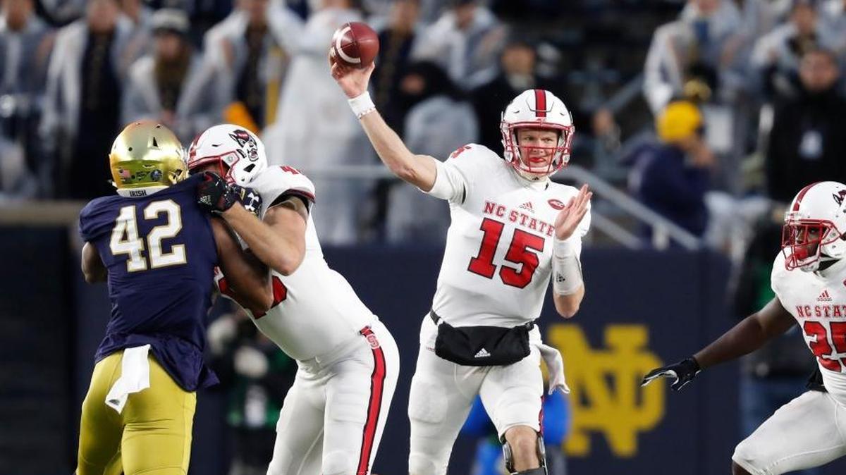 N.C. State quarterback Ryan Finley, middle, passes the ball during Notre Dame’s 35-14 win over the Wolfpack on Oct. 28.