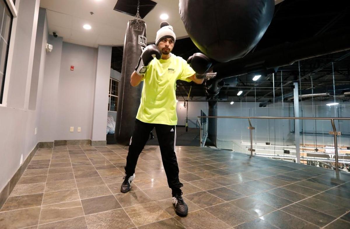 Carlos Olmeda works out at Title Boxing Gym in Cary on Oct. 16, 2017.