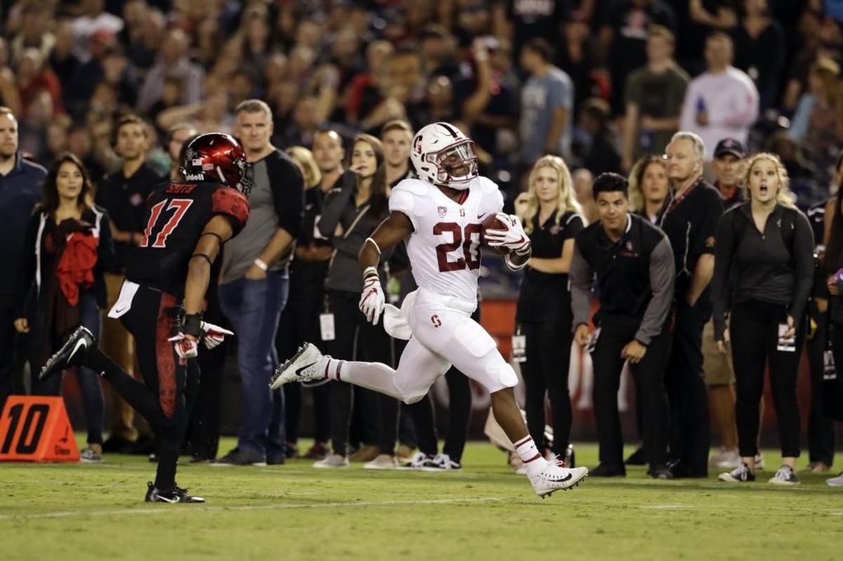 Stanford running back Bryce Love runs on his way to a touchdown during game against San Diego State on Sept. 16, 2017, in San Diego. (AP Photo/Gregory Bull)