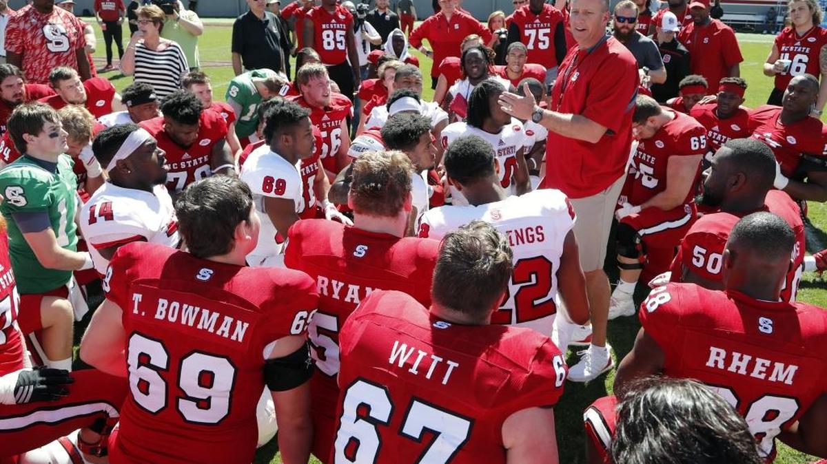 Wolfpack head coach Dave Doeren talks at the end of the Kay Yow N.C. State Red- White intrasquad spring football game at Carter-Finley Stadium on April 1, 2017.