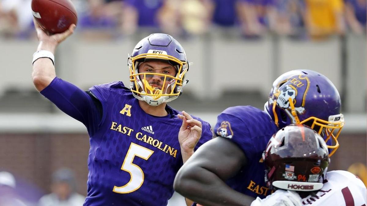 East Carolina’s Gardner Minshew (5) releases a pass during the first half of an NCAA college football game against Virginia Tech in Greenville, N.C., Saturday, Sept. 16, 2017. (AP Photo/Karl B DeBlaker)