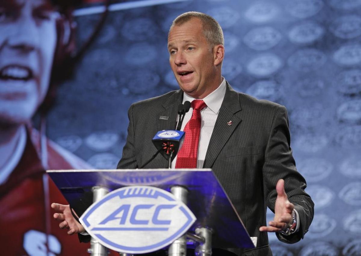North Carolina State head coach Dave Doeren speaks to the media during the Atlantic Coast Conference NCAA college football media day in Charlotte on July 13, 2017. (AP Photo/Chuck Burton)