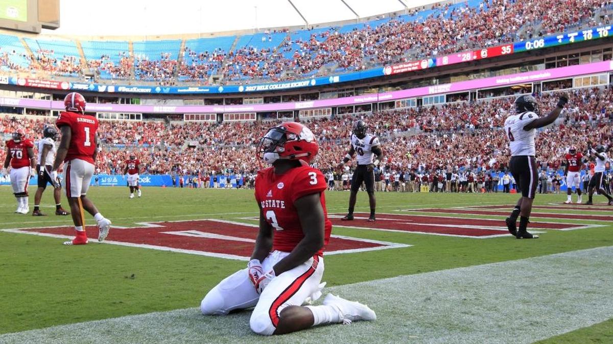 N.C. State wide receiver Kelvin Harmon (3) after the Wolfpack's final pass was deflected during South Carolina's 35-28 victory over N.C. State in the Belk College Kickoff at Bank of America Stadium in Charlotte, N.C., Saturday, Sept. 2, 2017.